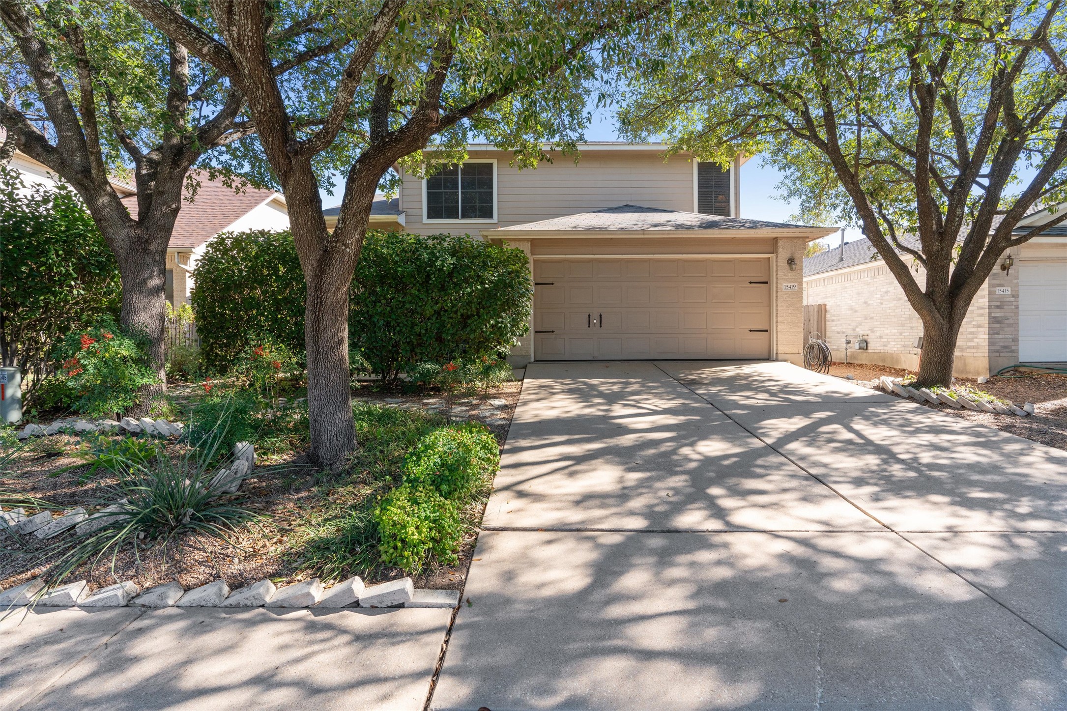 15419 Craig's Crest Path Pflugerville, TX 78660 - Photo 1 of 36 a view of a yard with large tree