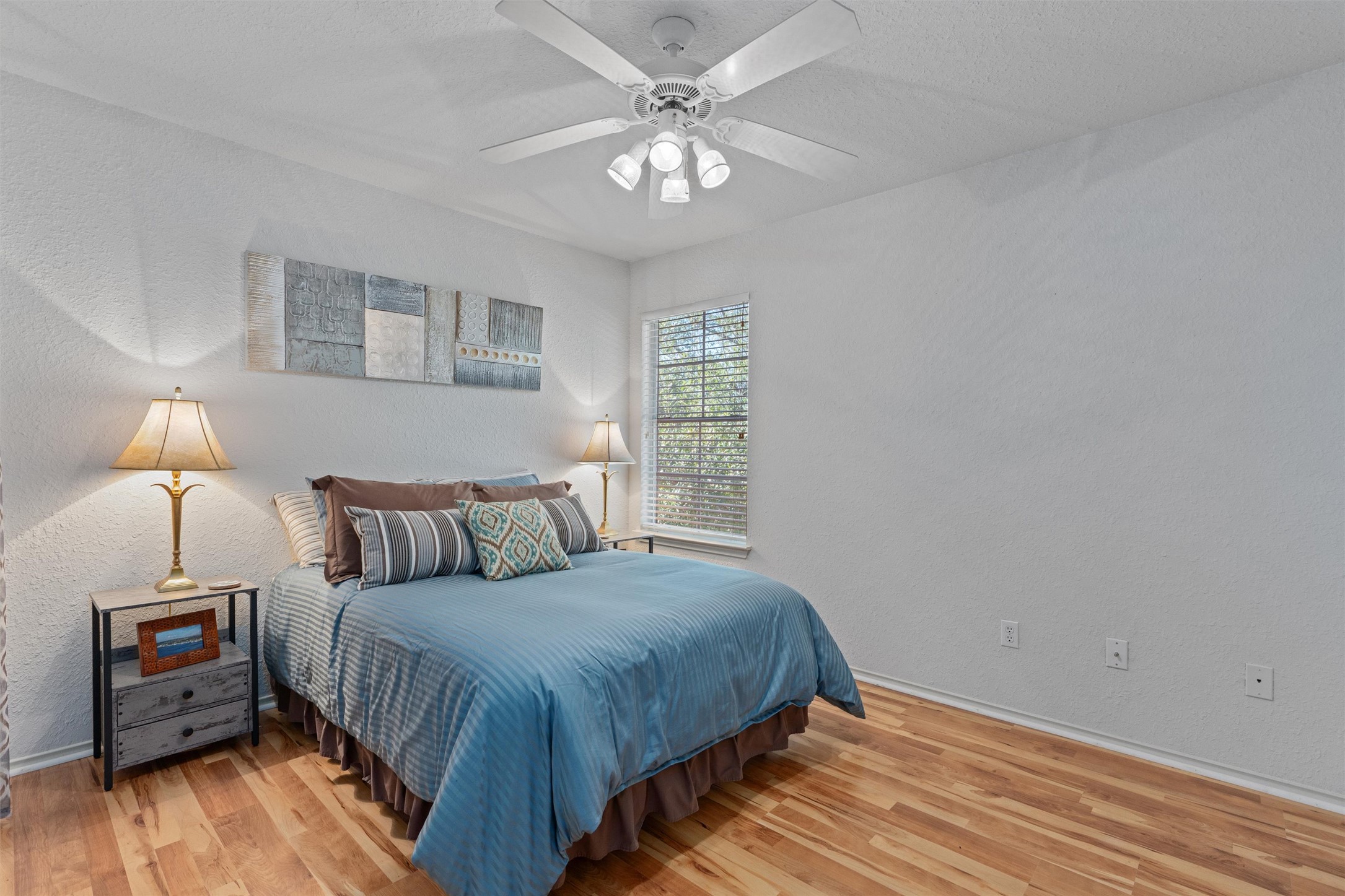 15419 Craig's Crest Path Pflugerville, TX 78660 - Photo 27 of 36 a bedroom with a bed and a ceiling fan