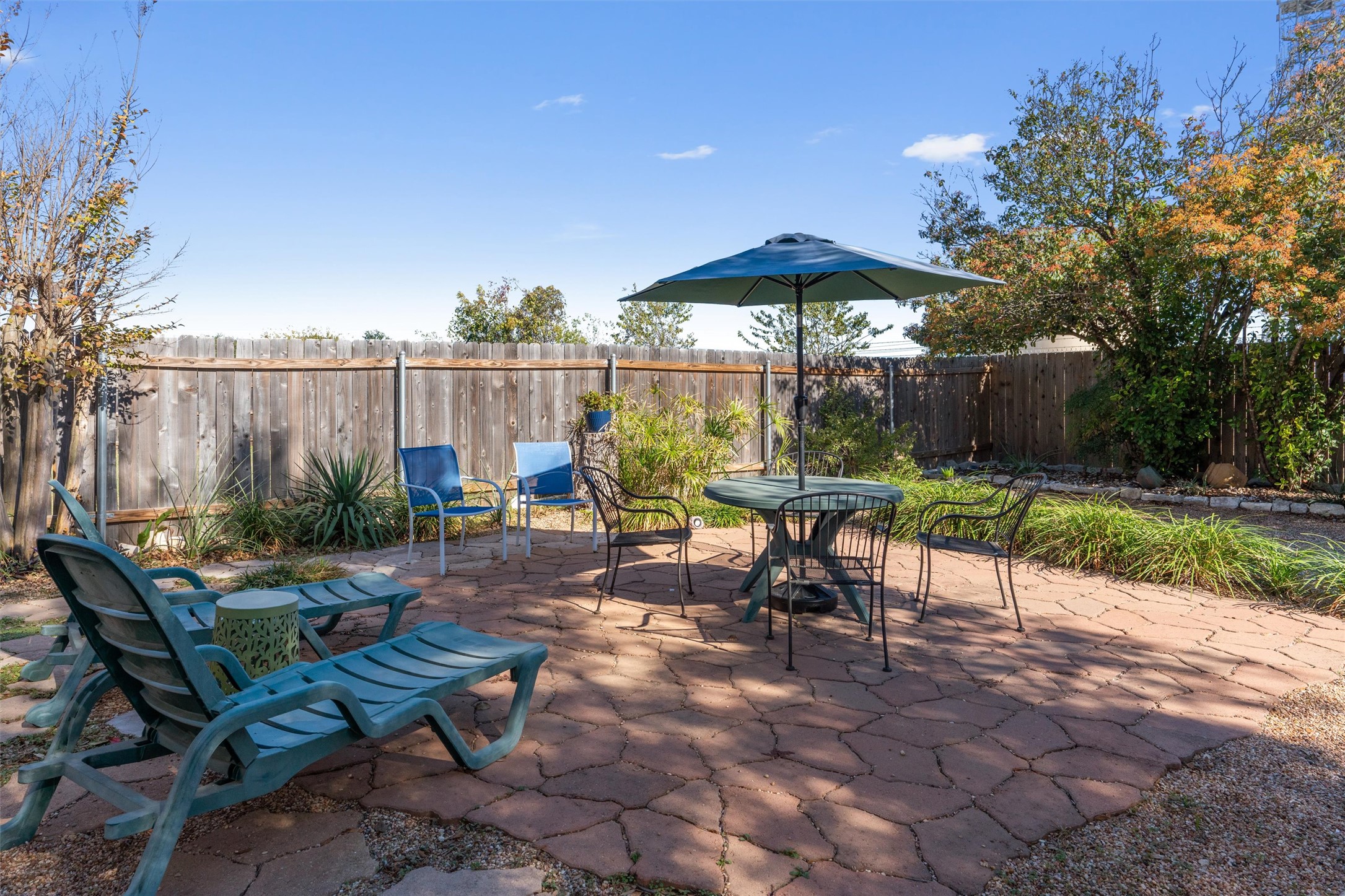 15419 Craig's Crest Path Pflugerville, TX 78660 - Photo 33 of 36 an outdoor sitting area with furniture and a garden