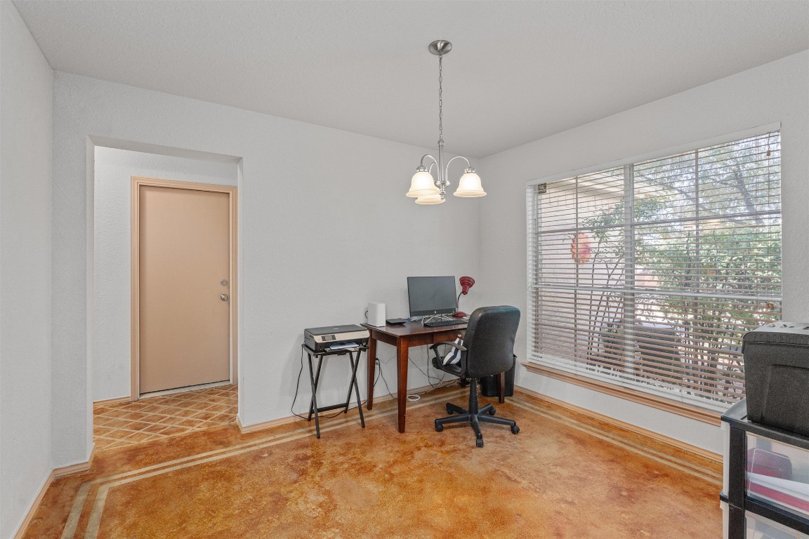 15419 Craig's Crest Path Pflugerville, TX 78660 - Photo 7 of 36 a workspace with furniture and a window