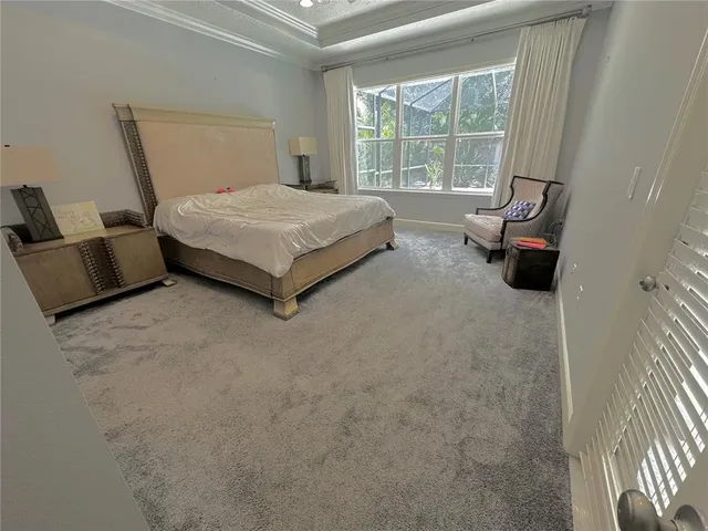 a living room with furniture a wooden floor and a fireplace