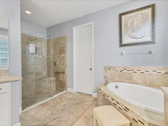 a view of a backyard with swimming pool