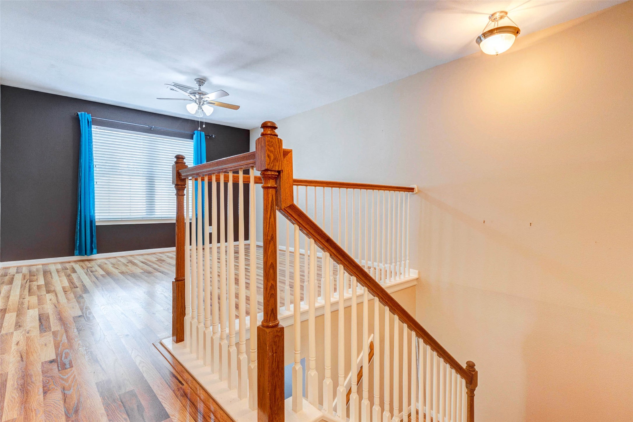 14522 Durham Chase Lane Houston, TX 77095 - Photo 24 of 40 a view of a hallway with wooden floor and staircase