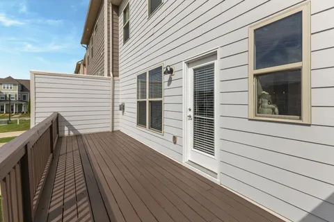 a view of deck with wooden floor and fence