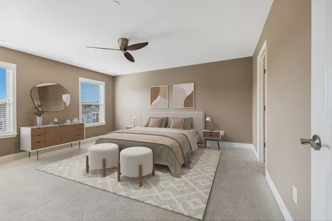 a bedroom with a bed and window