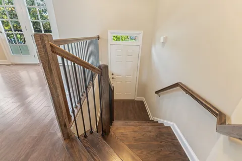 a view of a hallway view with staircase