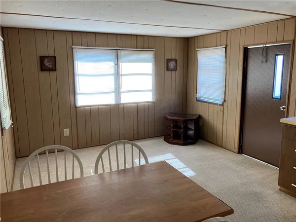 a view of a livingroom with furniture