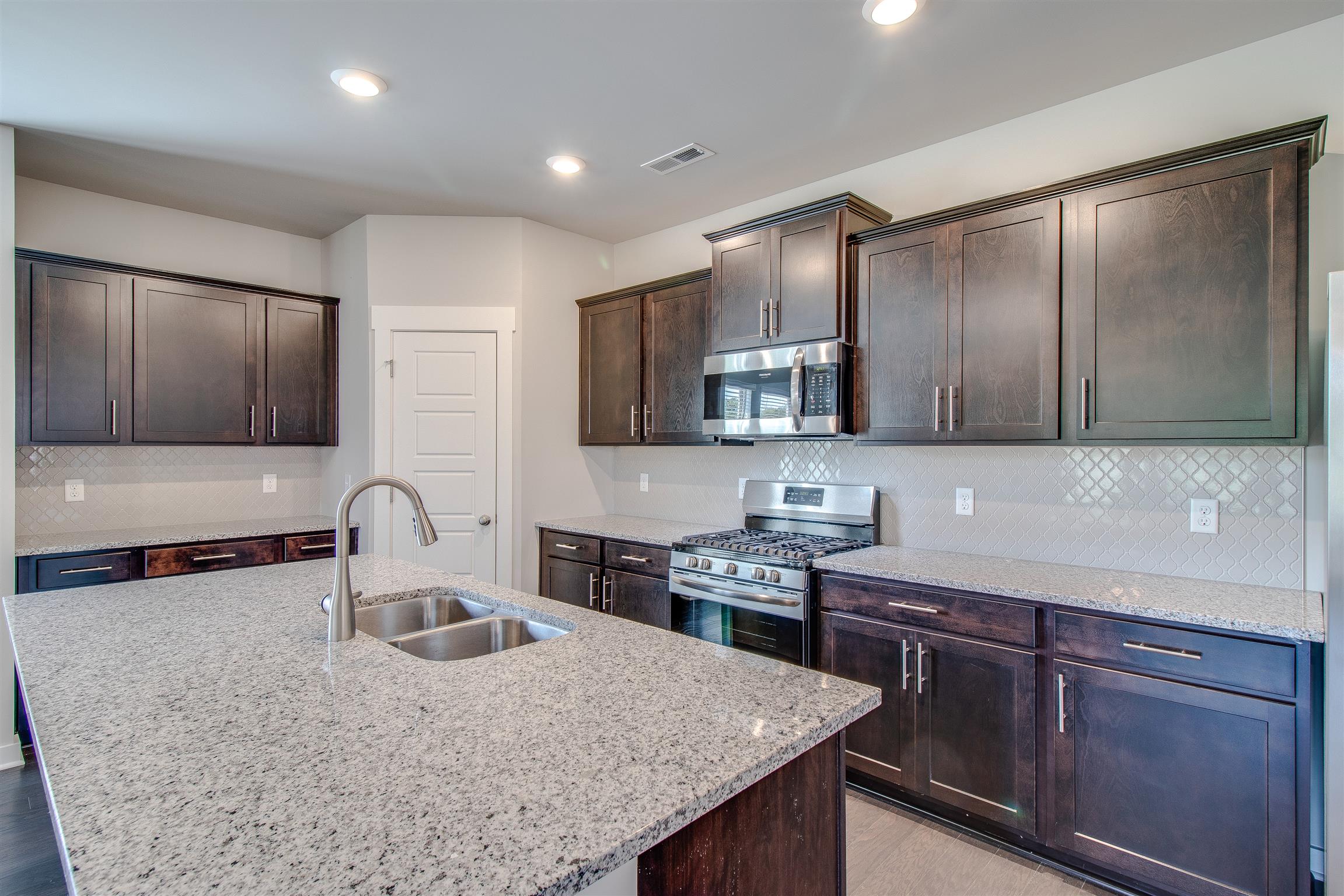 3166 Rift Lane Murfreesboro, TN 37130 - Photo 3 of 23 Gorgeous open kitchen with gas range and fridge!