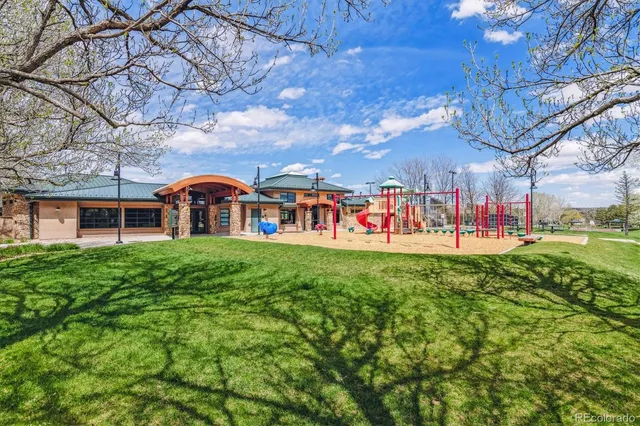 a front view of a building with garden