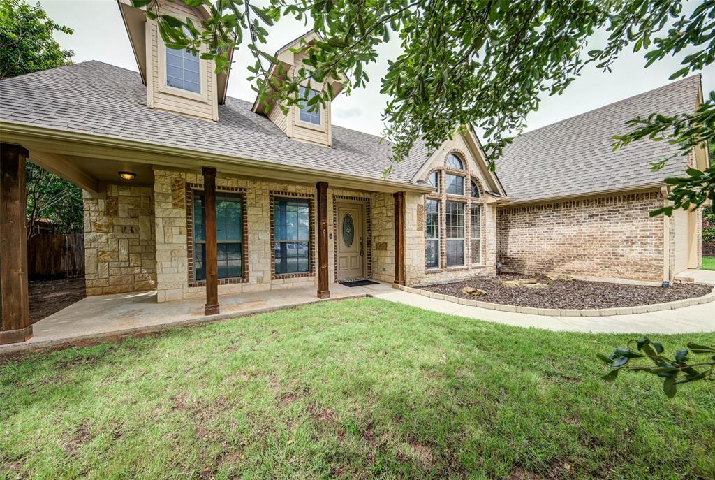 2105 Ridgewood Drive Bridgeport, TX 76426 - Photo 3 of 27 Inviting covered front porch with charming curb appeal