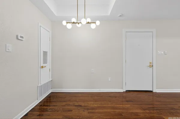 a kitchen with stainless steel appliances and cabinets
