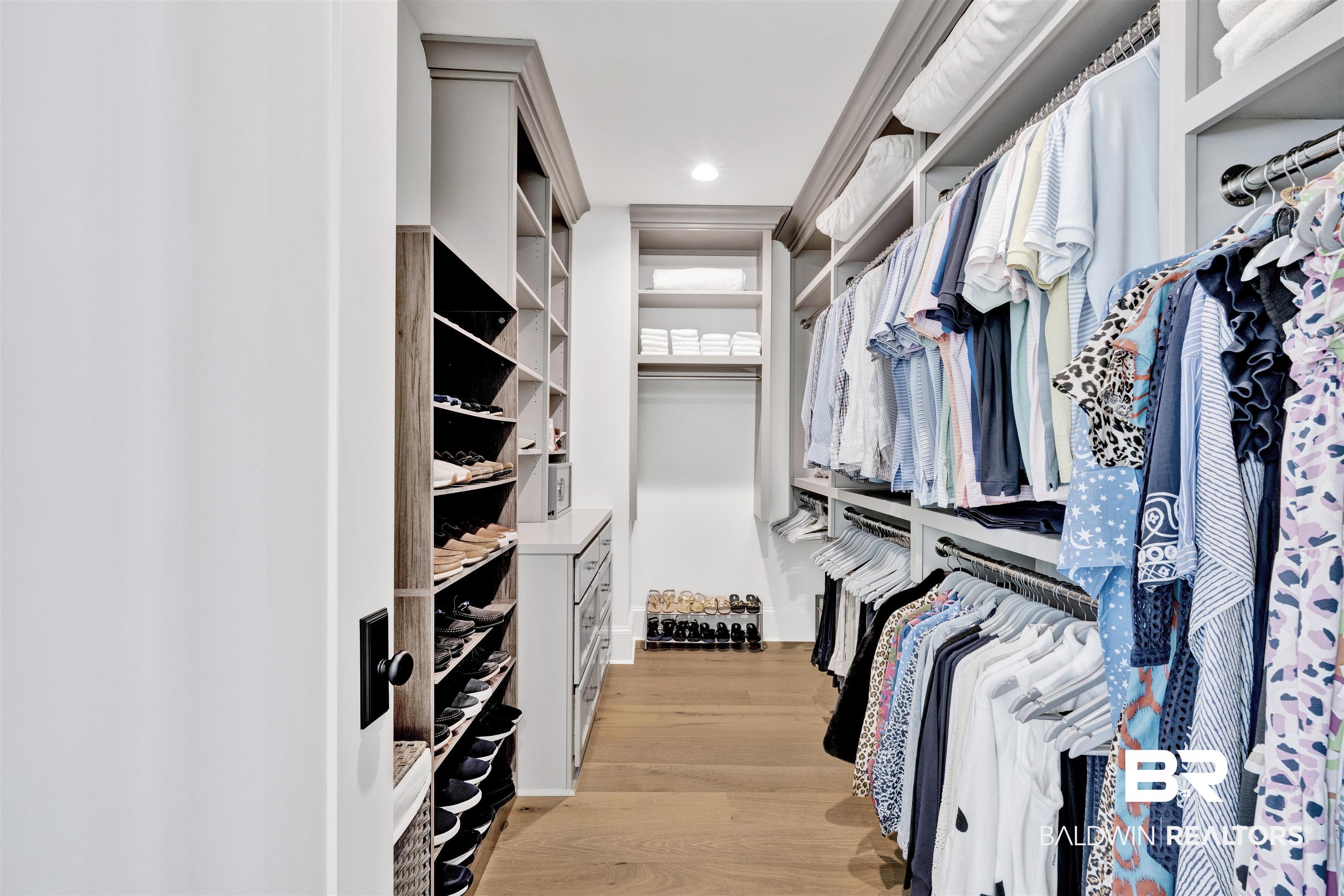 861 Inlet Circle Gulf Shores, AL 36542 - Photo 25 of 54 Walk in closet with light wood finished floors