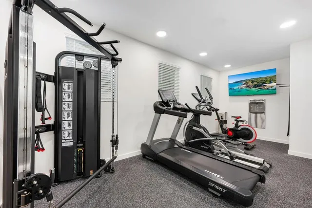 a view of a livingroom with furniture and wooden floor