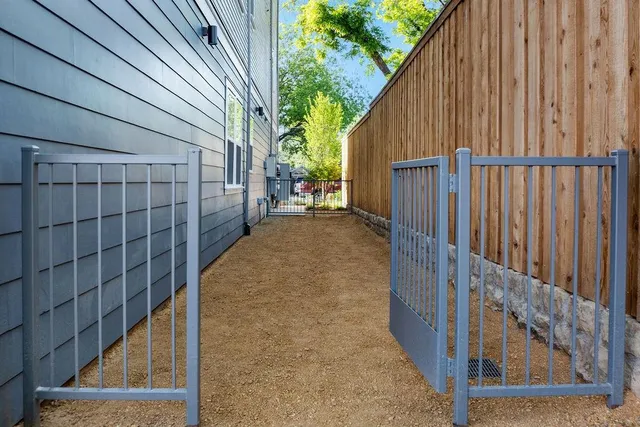 a view of a pathway of a house with wooden floor