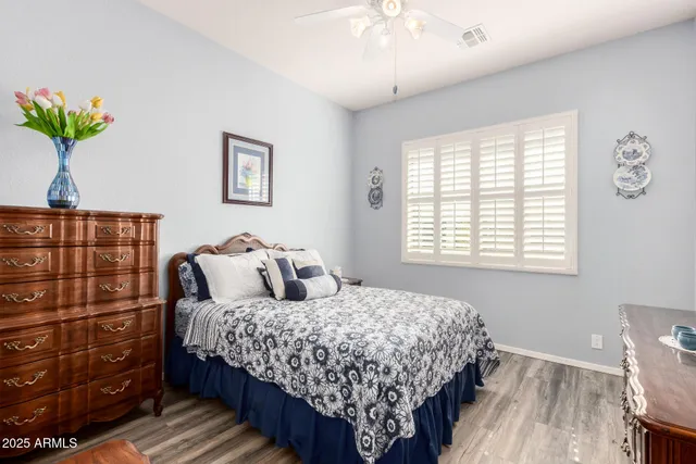 a kitchen with cabinets appliances and a window