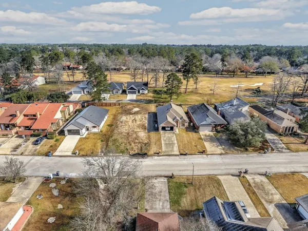 a view of a swimming pool with an ocean view