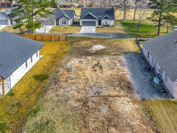 a view of swimming pool with a yard