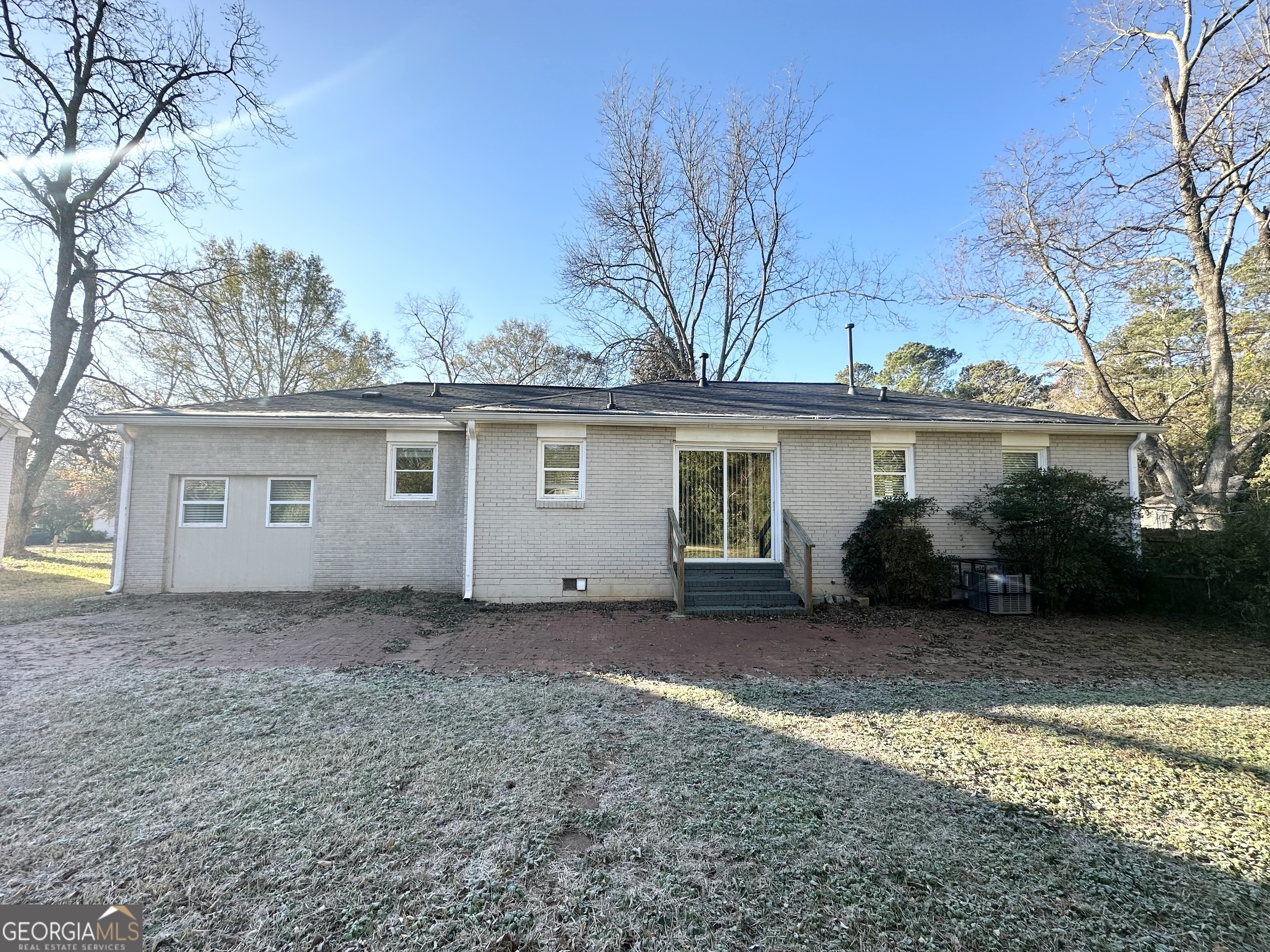 3438 Maryvale Drive Decatur, GA 30032 - Photo 13 of 13 a view of a house with a backyard and a tree