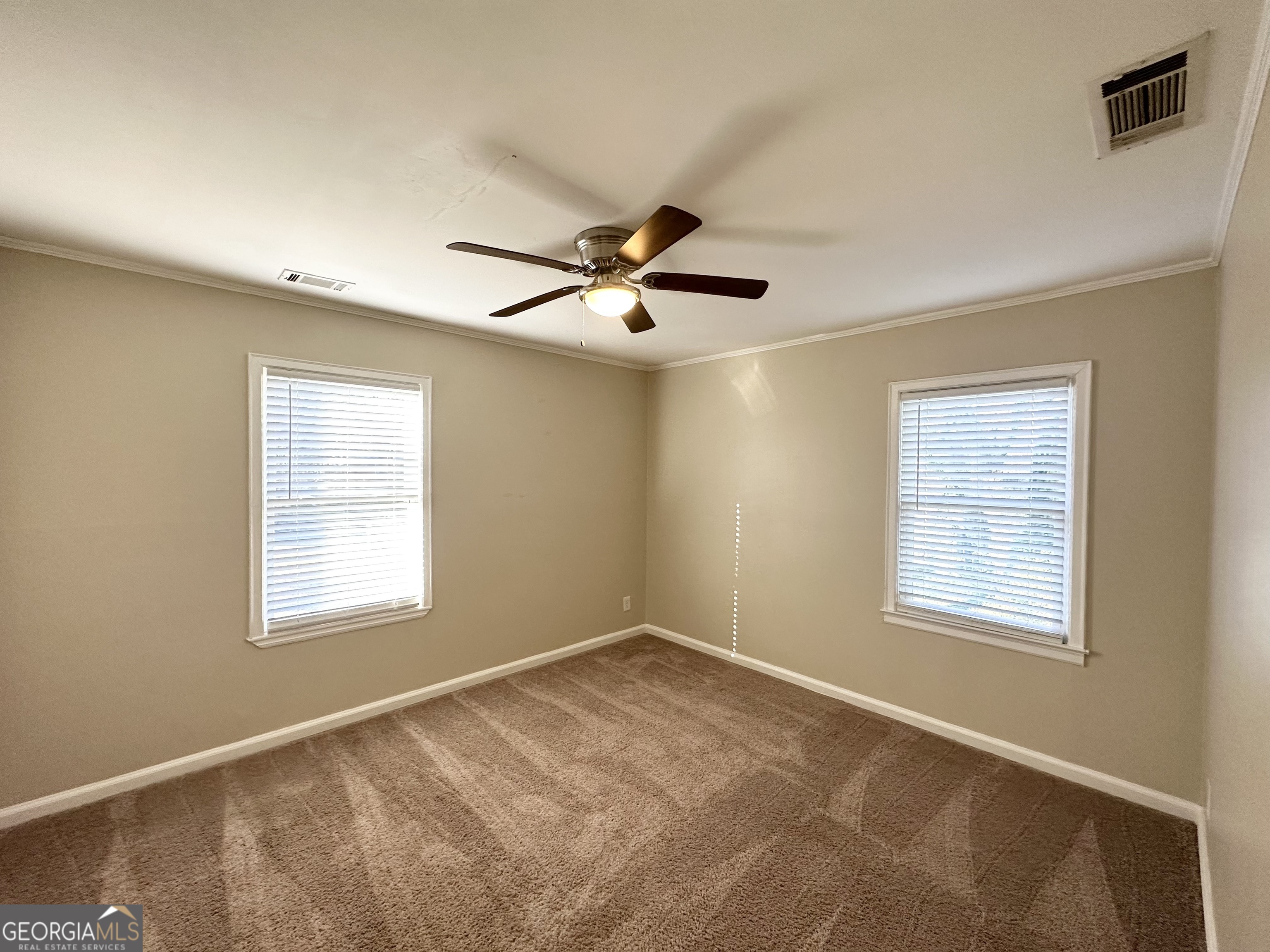 3438 Maryvale Drive Decatur, GA 30032 - Photo 6 of 13 a view of an empty room with a window