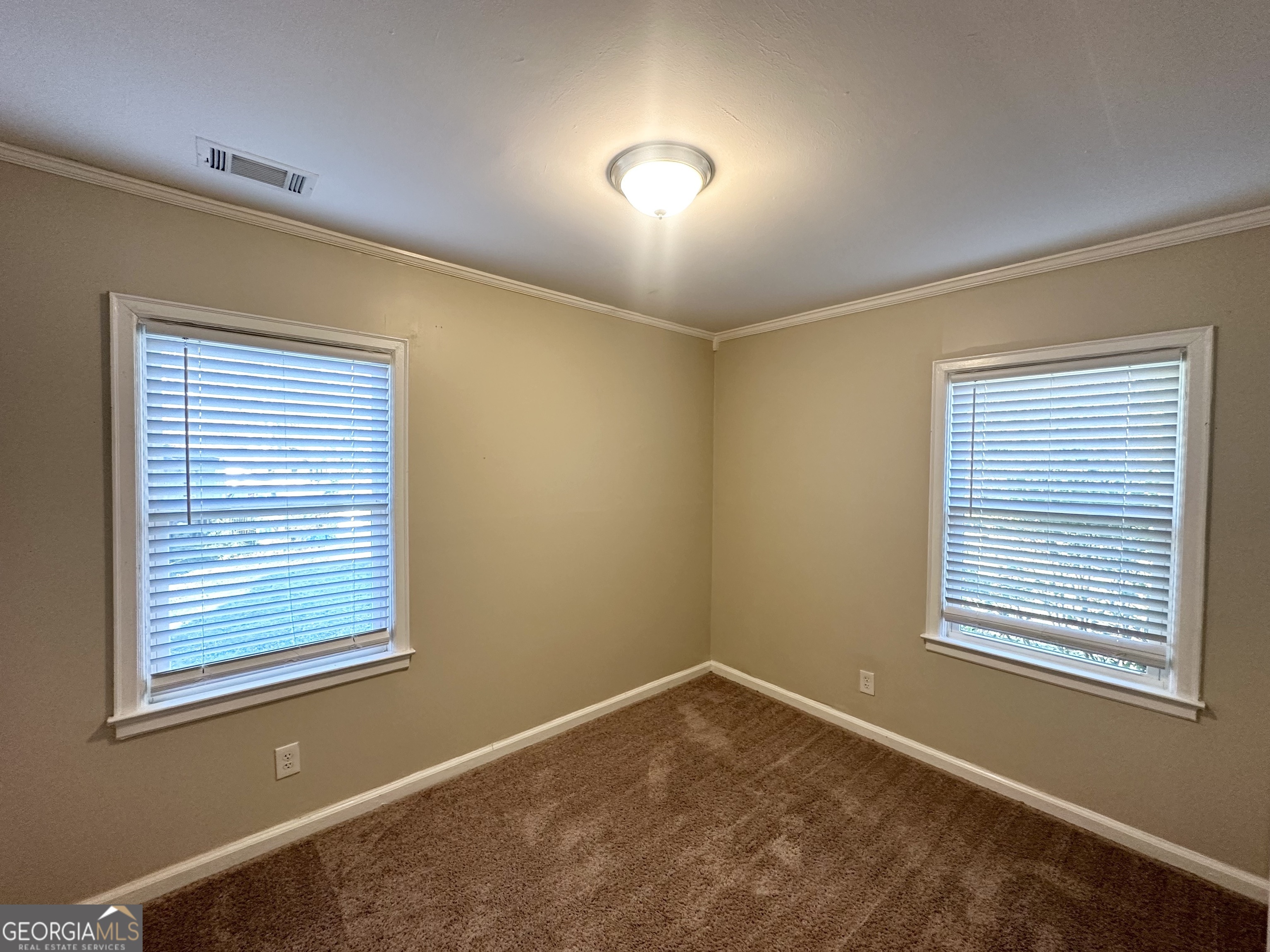 3438 Maryvale Drive Decatur, GA 30032 - Photo 7 of 13 a view of an empty room with a window