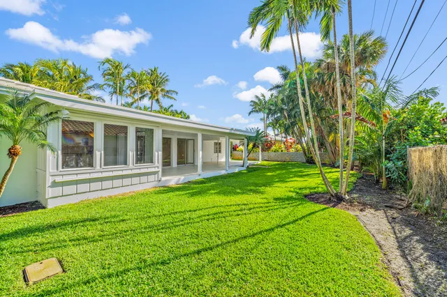 a house with garden in front of it