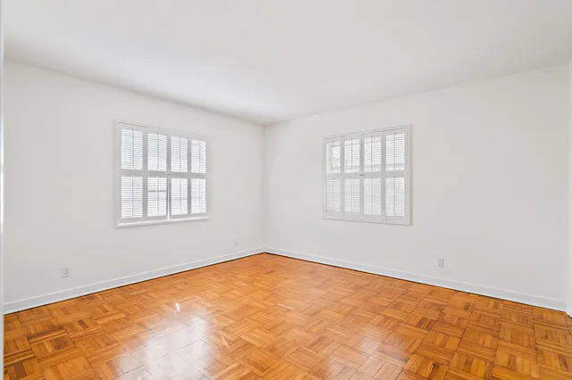 an empty room with windows