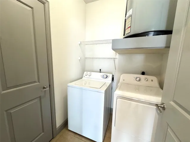a balcony with view of an outdoor space
