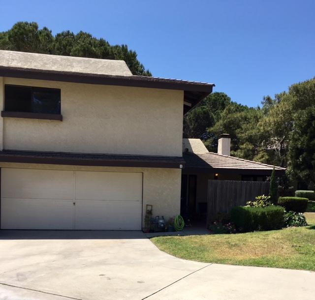 4409 Catlin Circle, Unit B Carpinteria, CA 93013 - Photo 1 of 13 a front view of a house with a yard