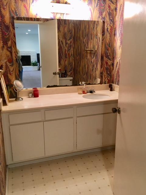 4409 Catlin Circle, Unit B Carpinteria, CA 93013 - Photo 4 of 13 a bathroom with a sink and a mirror