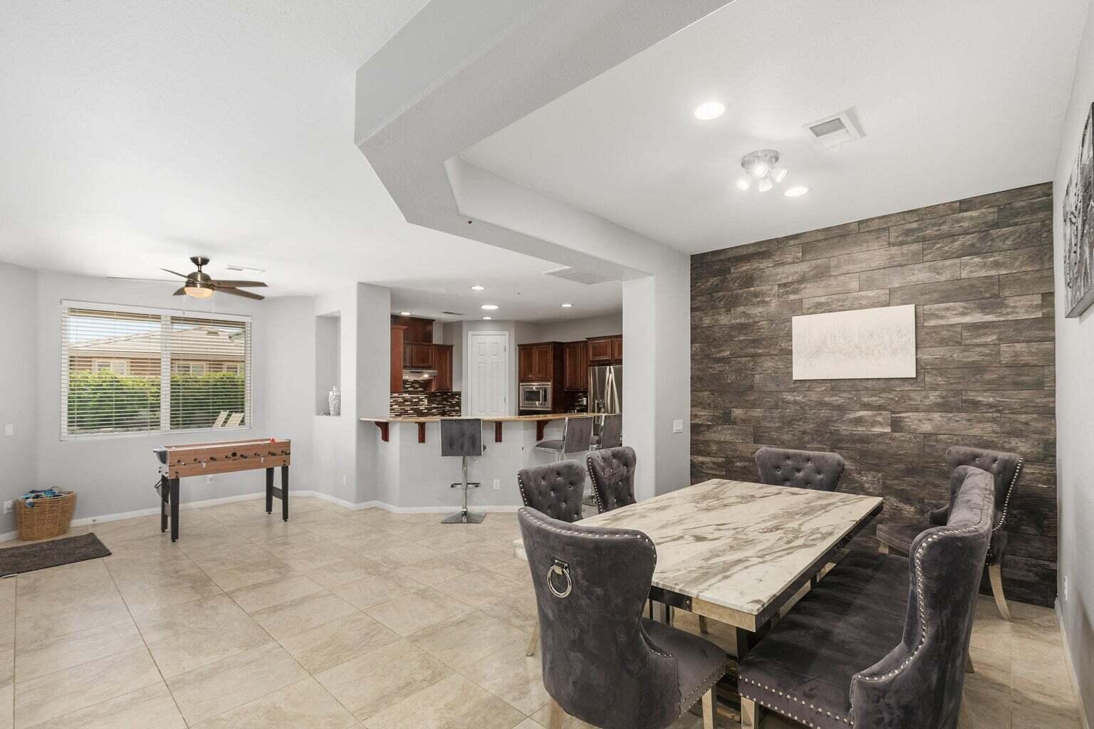 83631 Himalaya Drive Indio, CA 92203 - Photo 13 of 36 a view of a dining room with furniture window and outside view
