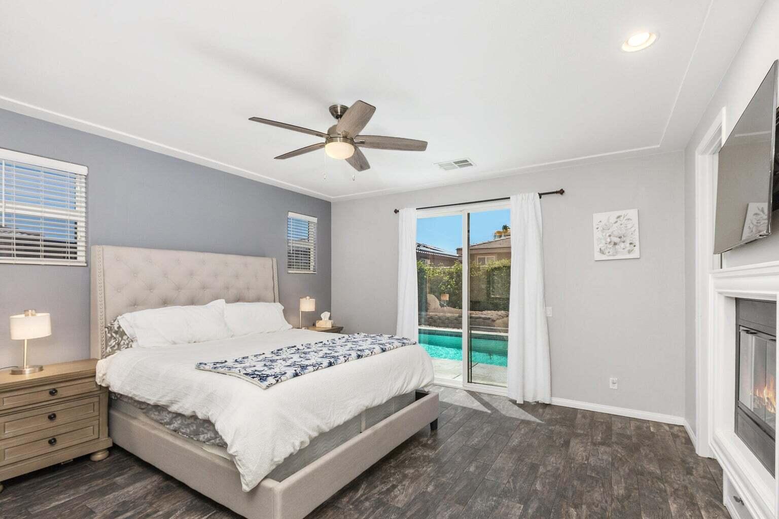 83631 Himalaya Drive Indio, CA 92203 - Photo 24 of 36 a bedroom with a large bed and a window