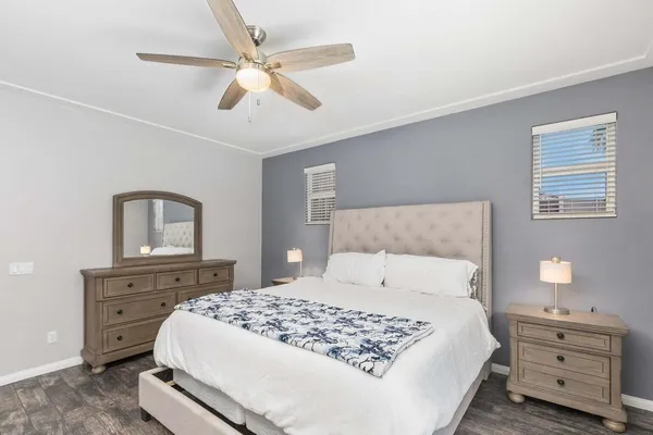 a bedroom with a bed and a dresser