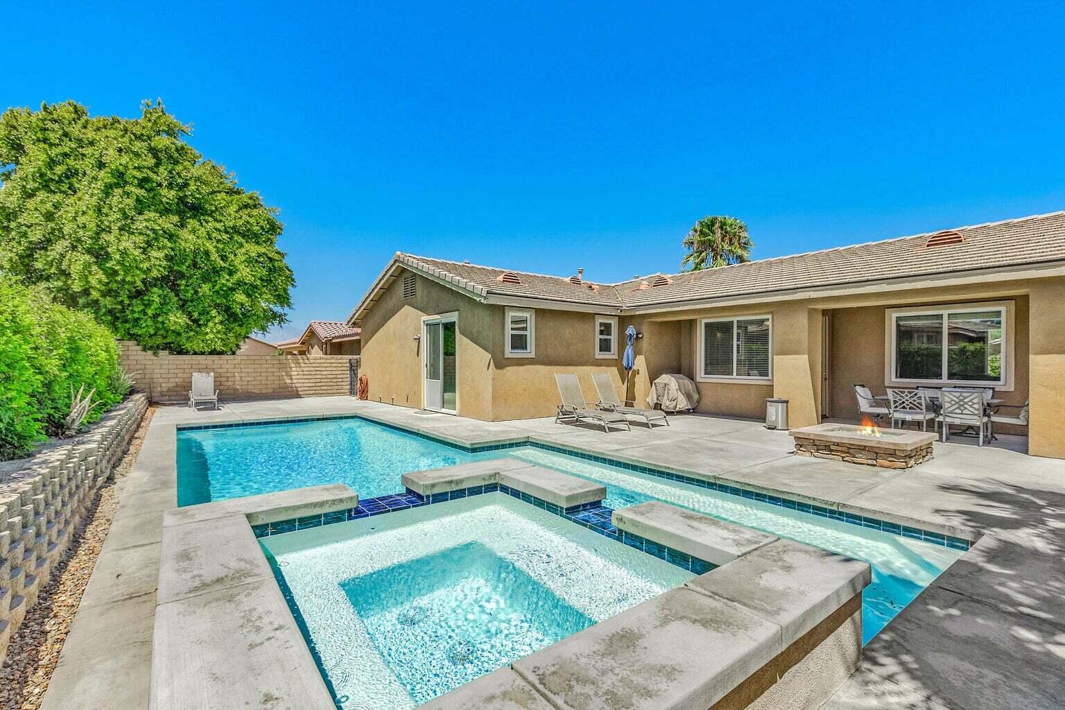 83631 Himalaya Drive Indio, CA 92203 - Photo 35 of 36 a view of a house with pool and sitting area