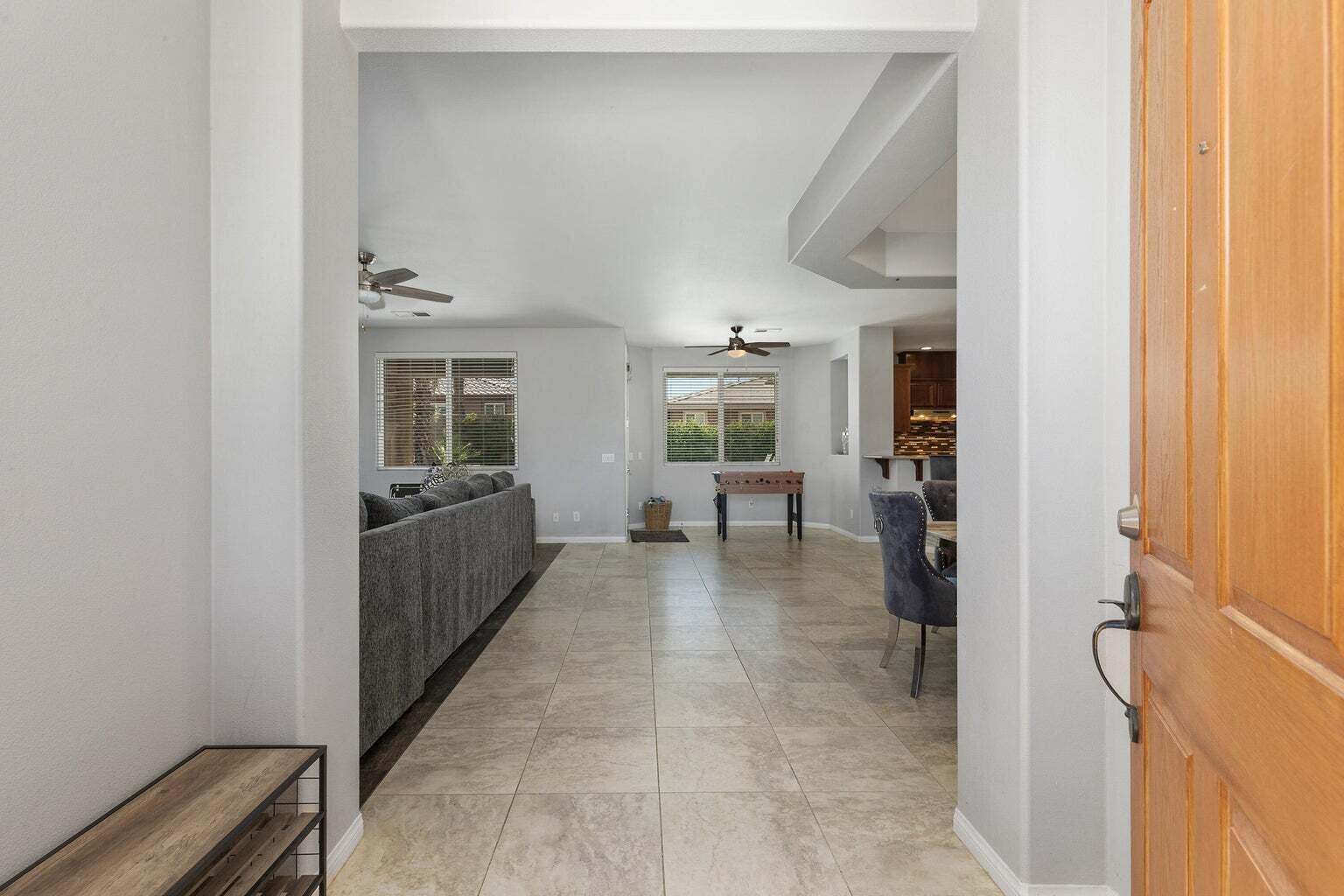 83631 Himalaya Drive Indio, CA 92203 - Photo 7 of 36 a view of a hallway with a couch