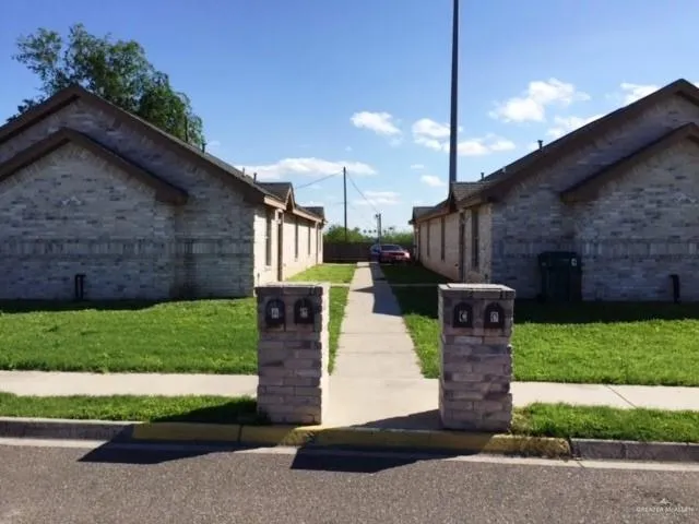a house view with a garden space