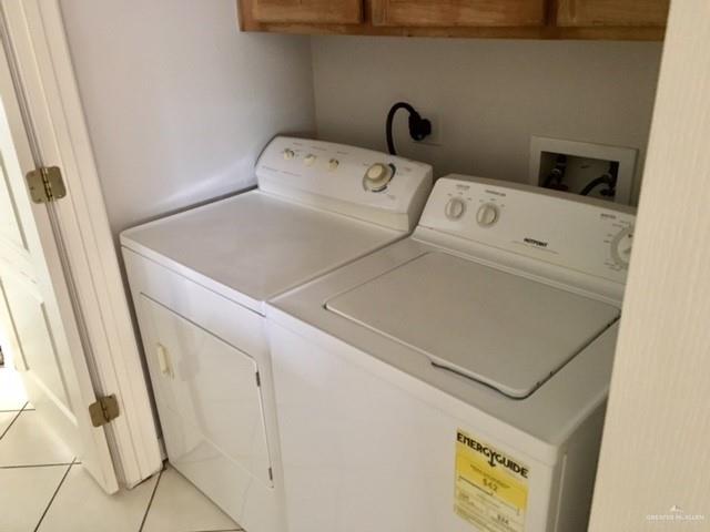 1606 East Quail Street Pharr, TX 78577 - Photo 9 of 10 a close up view of washer and dryer