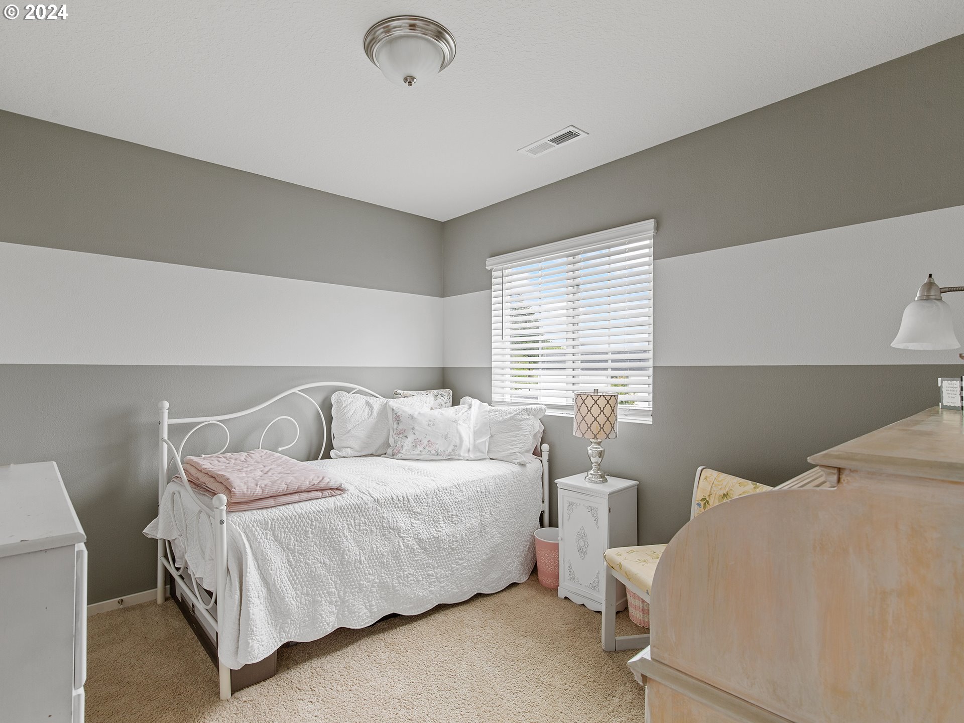 1928 South Robin Way Ridgefield, WA 98642 - Photo 20 of 27 a bedroom with a bed and window