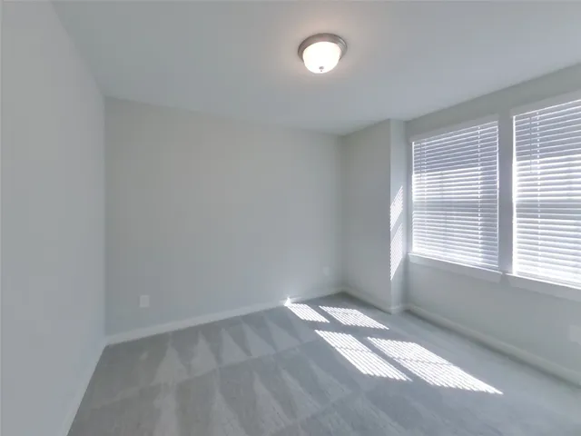 a view of a room with a window