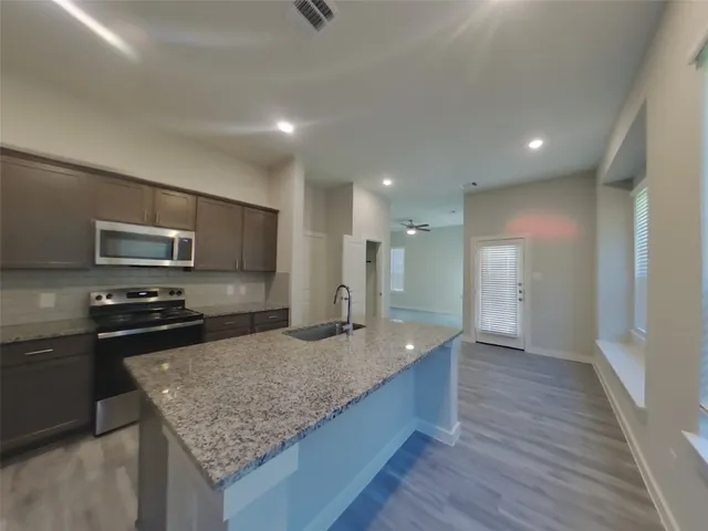 $2,079 | 9835 Willow Creek, Unit 202, Tomball, TX 77375