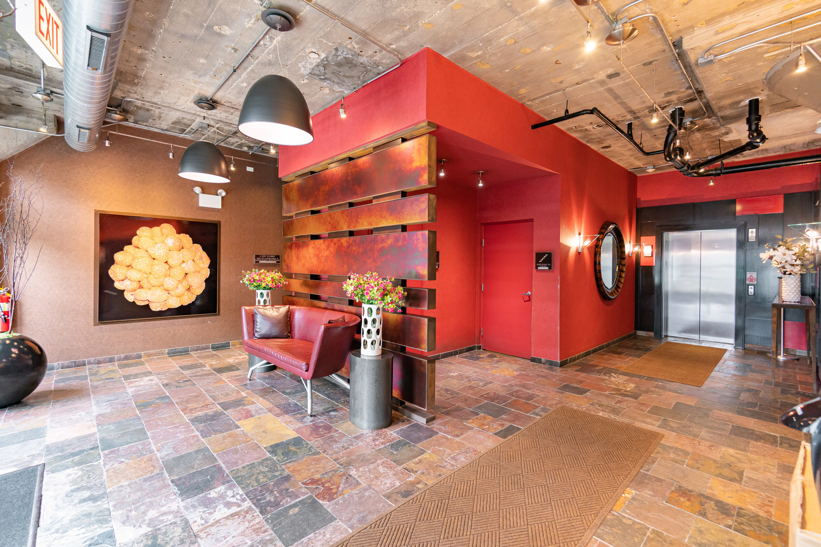 1069 West 14th Place, Unit 305 Chicago, IL 60608 - Photo 25 of 26 a view of a chairs and tables in the patio