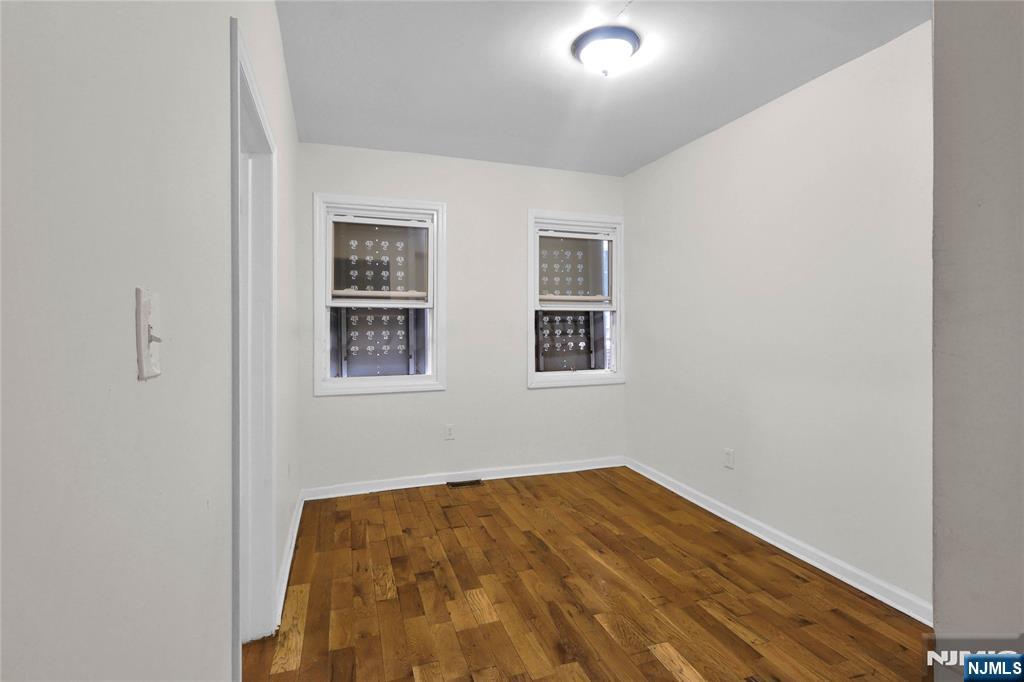 491 South 17th Street Newark, NJ 07103 - Photo 2 of 22 a view of empty room with wooden floor