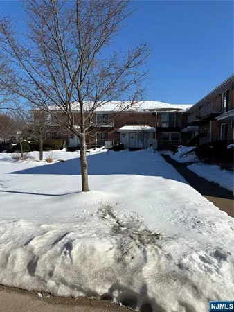 a view of a backyard of the house