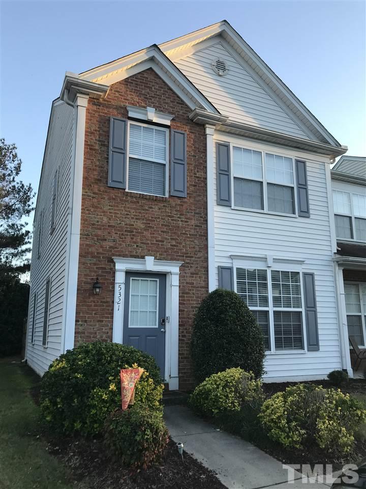 5321 Glen Canyon Road Raleigh, NC 27616 - Photo 1 of 3 a front view of a house with yard and parking