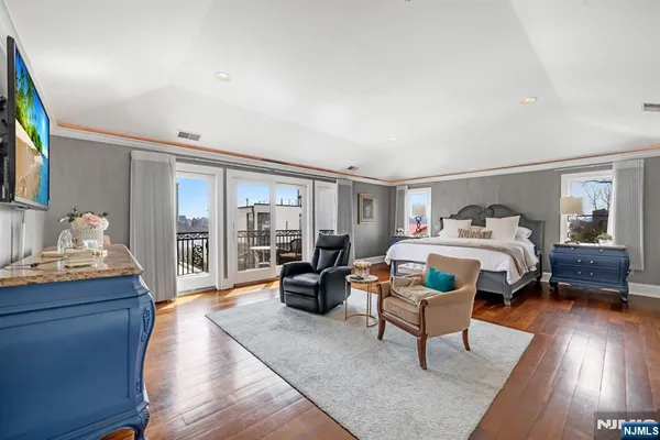 a bedroom with a bed and furniture