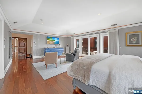 a view of a living room and a floor to ceiling window