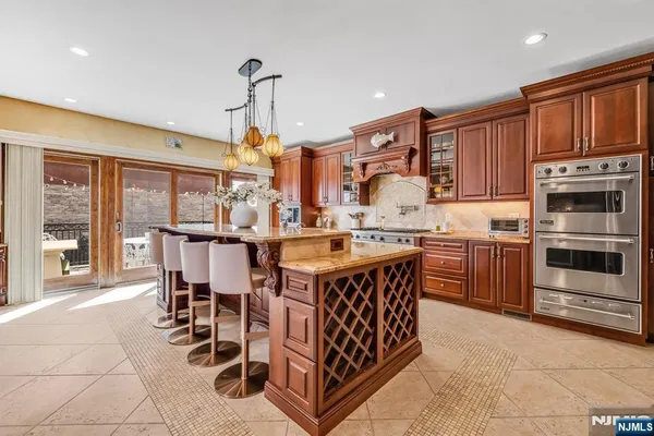 a kitchen with a sink cabinets and window