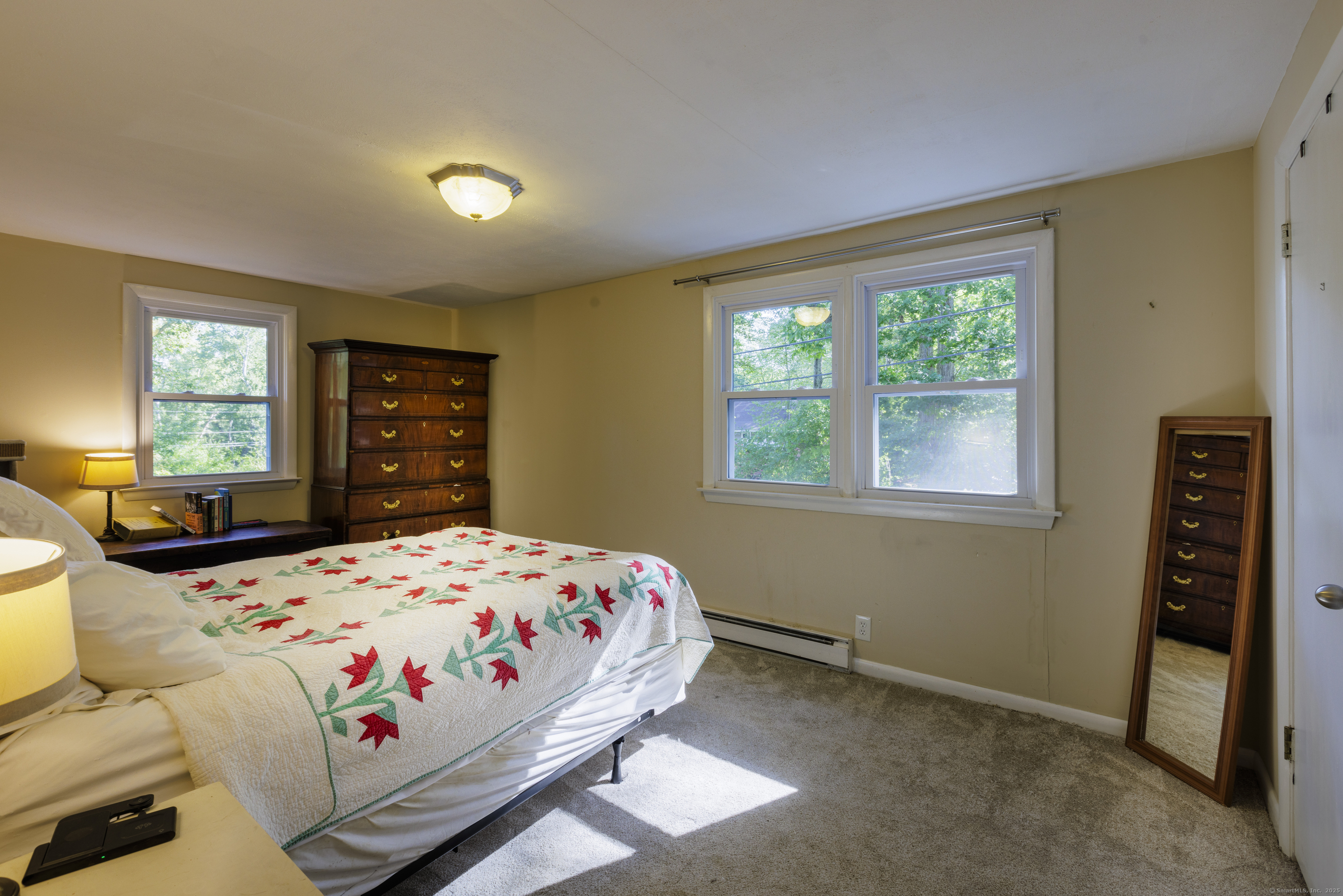 239 A Rockledge Road Lyme, CT 06371 - Photo 16 of 30 a bedroom with a bed and a dresser in it