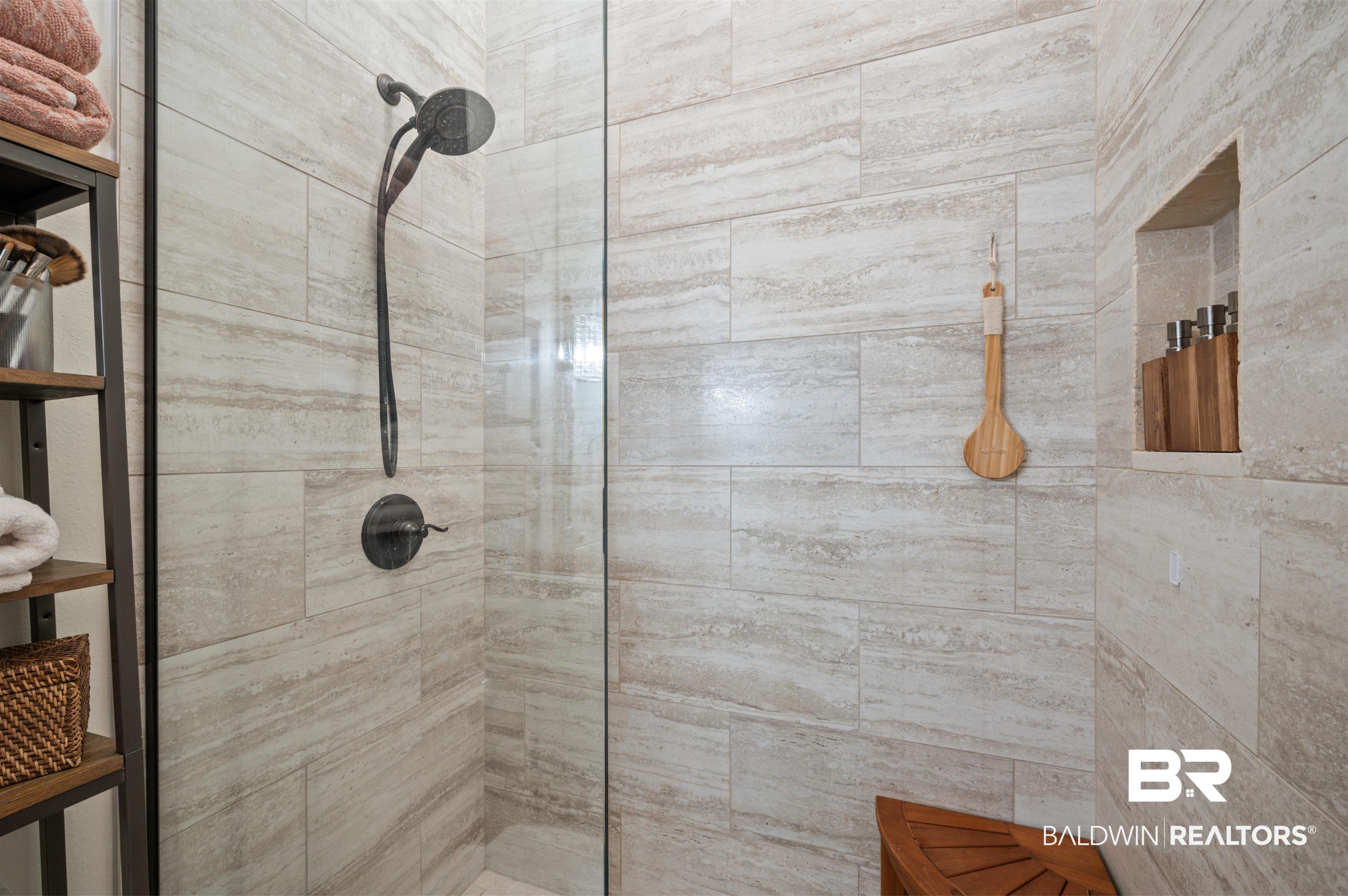 1430 Regency Road, Unit B202 Gulf Shores, AL 36542 - Photo 16 of 33 Full bathroom featuring a tile shower