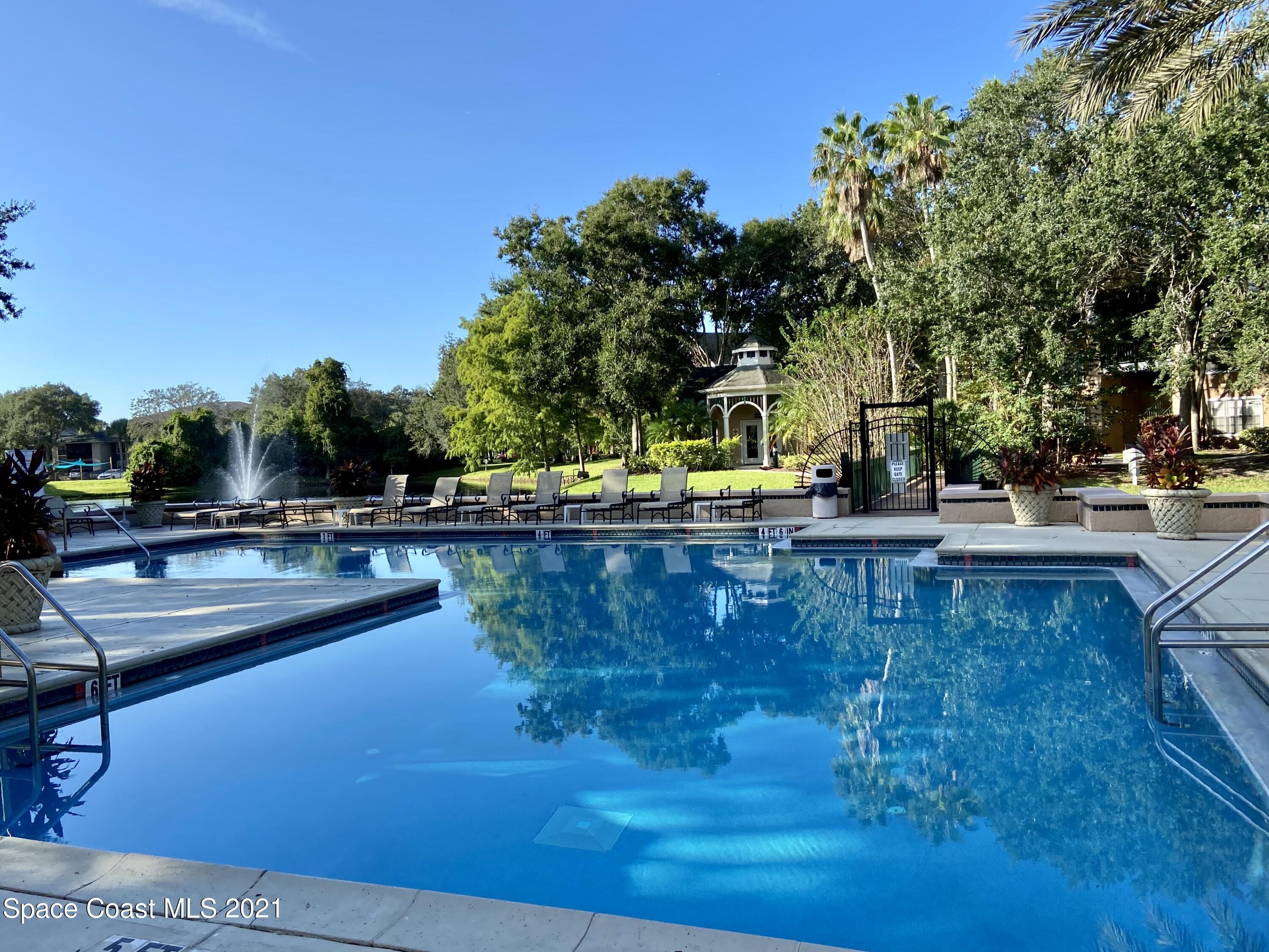 7667 North Wickham Road, Unit # 414 Melbourne, FL 32940 - Photo 12 of 24 Sparkling Pool