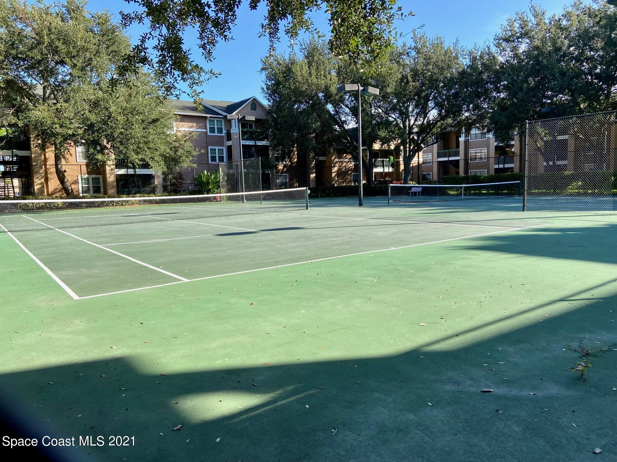 7667 North Wickham Road, Unit # 414 Melbourne, FL 32940 - Photo 21 of 24 Lighted Tennis Courts